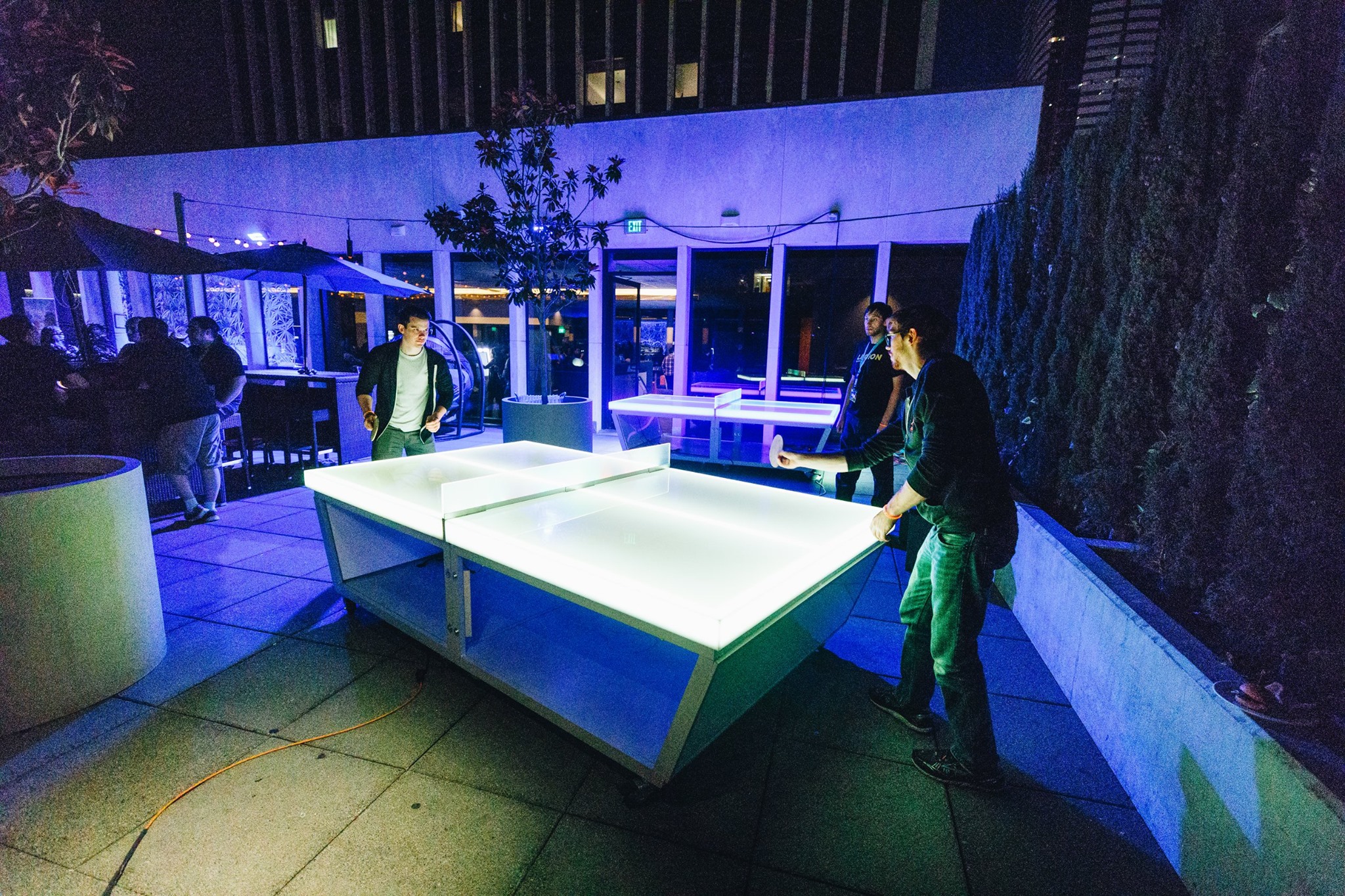 justin and colby playing air hockey